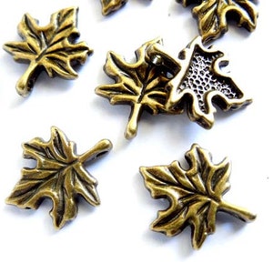 10 Antique Bronze Maple Leaf Charms 21-47-4 image 1