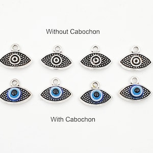 May include: Eight silver evil eye charms, four with blue and white cabochons and four without. The charms are in two rows of four, with the text "Without Cabochon" above the top row and "With Cabochon" below the bottom row.