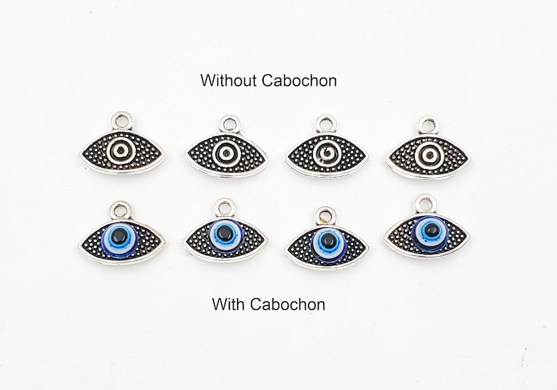 May include: Eight silver evil eye charms, four with blue and white cabochons and four without. The charms are in two rows of four, with the text "Without Cabochon" above the top row and "With Cabochon" below the bottom row.