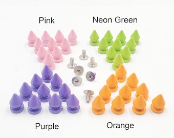 May include: Assortment of 12 colourful plastic cone-shaped studs with screw backs. The colours are pink, neon green, purple, and orange.
