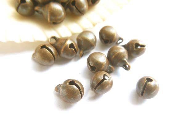 アンティークブロンズベルチャーム 25 個 - 20-5-4 - Etsy 日本