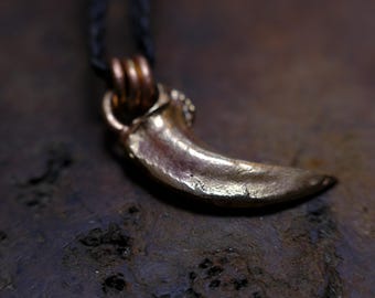 Pendentif griffe de loup en laiton avec collier de style tissé main réglable