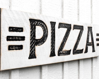 May include: A white wooden sign with black lettering that reads "=PIZZA=".