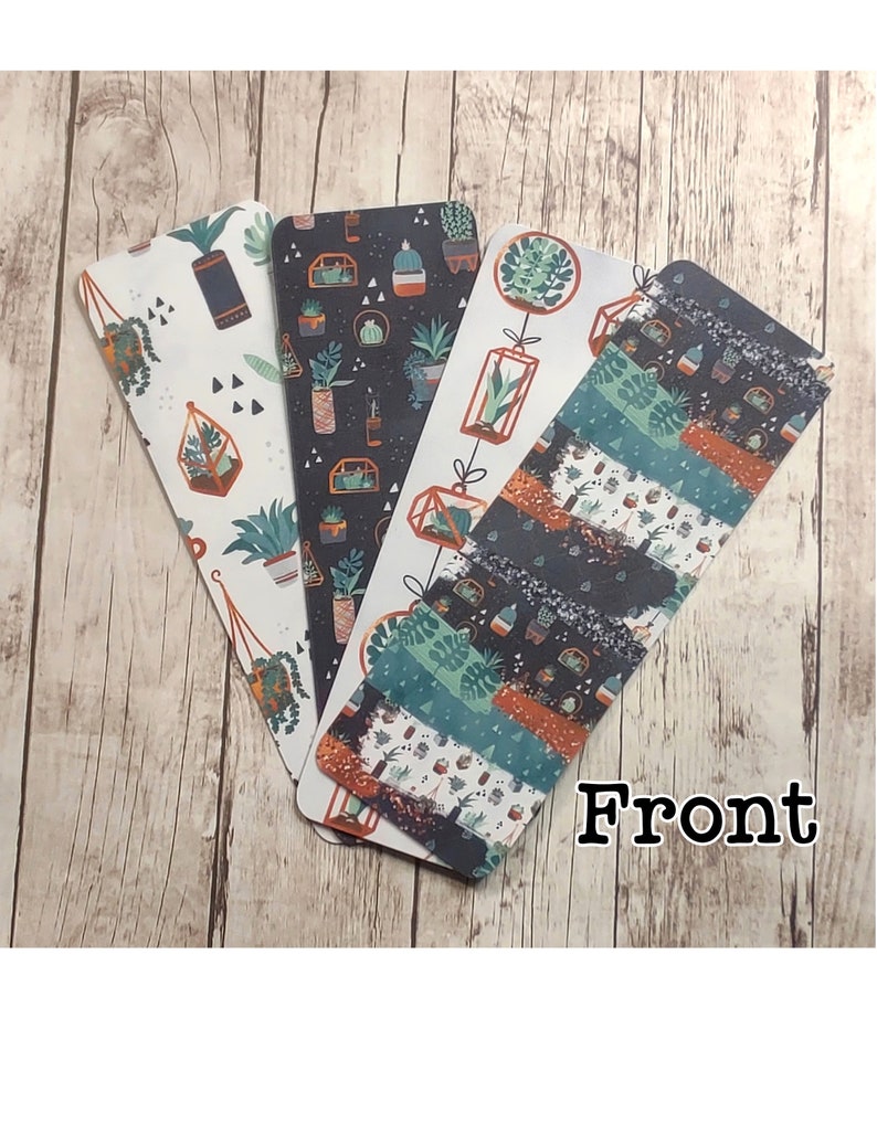 May include: Four different bookmark designs featuring a variety of potted plants in geometric shapes. The bookmarks are printed on a white background with black, green, orange, and brown accents. The word "Front" is printed in black at the bottom of the image.