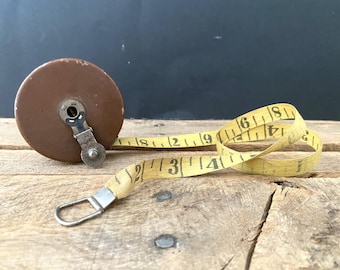 Ruban à mesurer en tissu de 25 pieds de long, vintage, dans un étui rigide marron