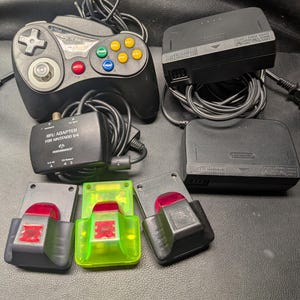 N64 lot Controller power adapters RF rumble packs Nintendo 64