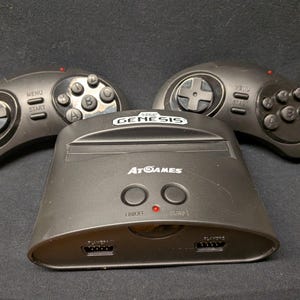 Sega Genesis AtGames built in 80 games plus has cartridge slot 2 wireless controllers