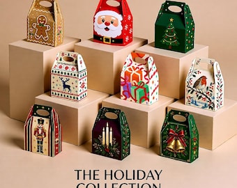 May include: A collection of nine gable-style gift boxes featuring holiday-themed illustrations including a gingerbread man, Santa Claus, a Christmas tree, a reindeer, wrapped presents, a robin, a nutcracker, candles, and bells with the text THE HOLIDAY COLLECTION.