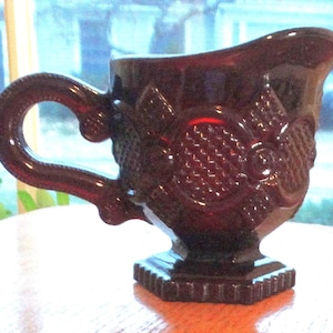 Avon 1876 Cape Cod Collection Ruby Red Sandwich Glass Footed Creamer