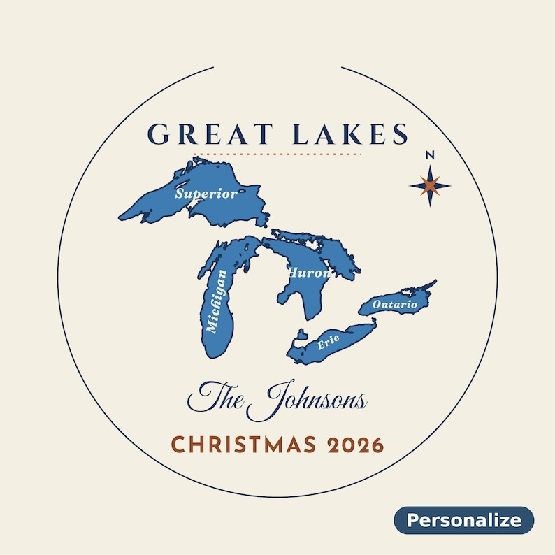 May include: A circular graphic featuring a blue map of the Great Lakes labelled Superior, Michigan, Huron, Erie, and Ontario. It includes a compass rose, the text The Johnsons, and CHRISTMAS 2026 in dark blue and brown on a cream background.