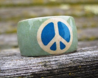 Ocean Peace Symbol -- adjustable wood ring