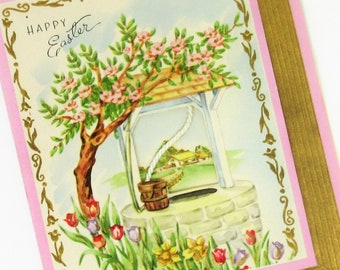 Vintage Unused Happy Easter Greeting Card Featuring Flowering Cherry Blossoms and Tulips, a Stone Well, and a Bucket with Rope Embellishment