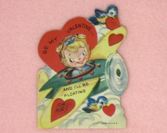 Vintage Unused Valentines Day Card Featuring a Blonde Girl Flying in an Airplane Be My Valentine and I'll Be Floating on Air Classroom Cards