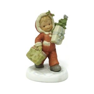 Vintage 1995 Enesco Christmas Porcelain Figurine Featuring a Girl Wearing a Snowsuit and Carrying a Wrapped Present Memories of Yesterday