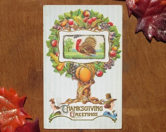 Antique Happy Thanksgiving Greetings Postcard Featuring a Holiday Turkey Pilgrims and Tree with Pumpkin Corn Apples Glitter Accents, Vintage