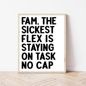 May include: Black and white framed print with the text "Fam. The Sickest Flex is Staying On Task No Cap."