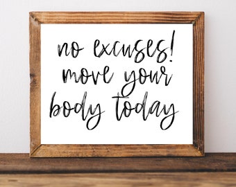 May include: A framed motivational quote in black script on a white background. The quote reads "no excuses! move your body today". The frame is made of wood with a brown stain.