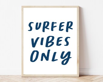 May include: A framed print with the text "SURFER VIBES ONLY" in a dark blue color on a white background.