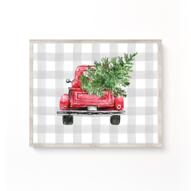 May include: A red vintage pickup truck with a green Christmas tree in the back, on a white and gray gingham background.