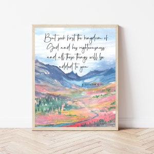 May include: A watercolor painting of a mountain landscape with a quote from the Bible: "But seek first the kingdom of God and his righteousness and all these things will be added to you." Matthew 6:33