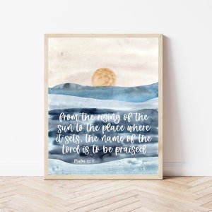 May include: A watercolor painting of a sunset over the ocean with the text "from the rising of the sun to the place where it sets, the name of the Lord is to be praised Psalm 113:3".