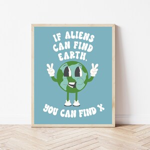 May include: A blue poster with a cartoon Earth character with a smiling face and peace signs. The text reads "If aliens can find Earth, you can find X".