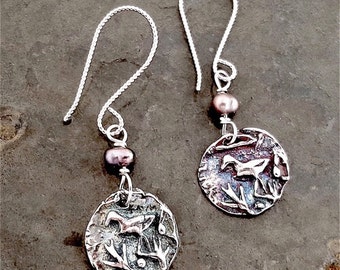 Sterling Silver Ancient Bird Earring with Freswater Pearls.