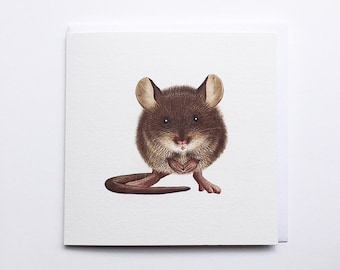 May include: A square greeting card featuring a detailed illustration of a brown mouse. The mouse has large ears, a long tail, and is holding its paws together. The card is white with a subtle texture.