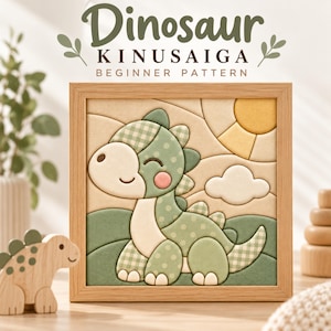 May include: A framed Kinusaiga fabric art piece featuring a green dinosaur with polka dot and gingham patterns. The scene includes a yellow sun and a white cloud against a beige background. The text reads Dinosaur KINUSAIGA BEGINNER PATTERN.