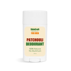 May include: White deodorant stick with a green and brown label that says "SkinCraft Organics For Men Patchouli Deodorant 100% Natural No Aluminum 2.5 oz"