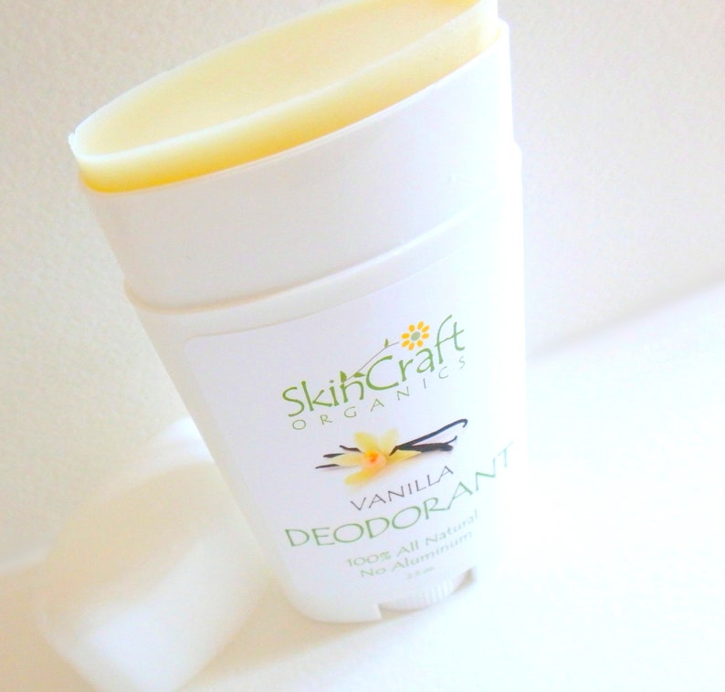 May include: A white deodorant stick with a yellow label that says "SkinCraft Organics Vanilla Deodorant 100% All Natural No Aluminum".
