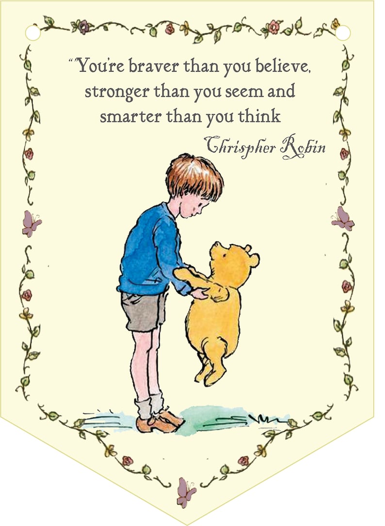 May include: A yellow and brown cartoon bear is being held up by a boy with brown hair. The boy is wearing a blue shirt and brown shorts. The image is surrounded by a decorative border of green vines and flowers. The text reads "You're braver than you believe, stronger than you seem and smarter than you think. Christopher Robin."