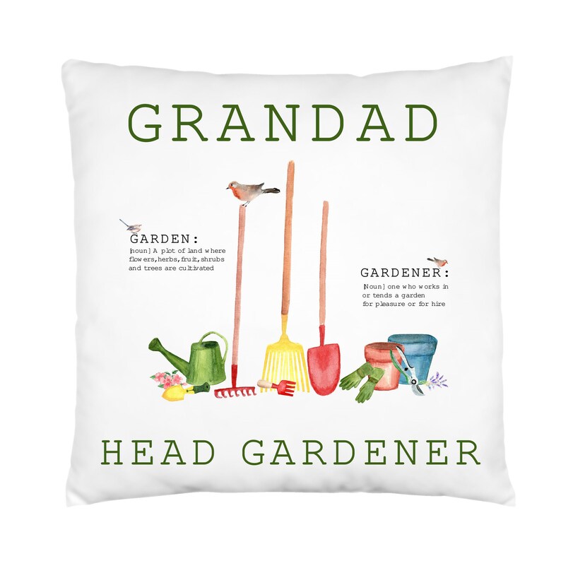 May include: White cushion with green text that reads "GRANDAD HEAD GARDENER". The cushion features a watercolour illustration of gardening tools, a bird, and a lemon.