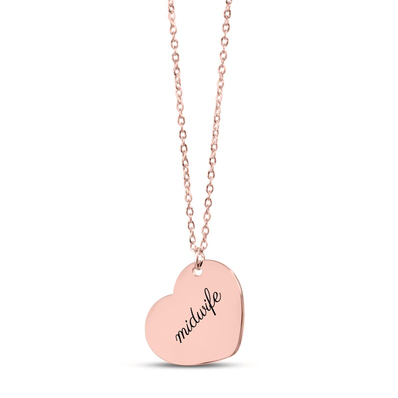 May include: A rose gold-toned heart-shaped pendant necklace featuring a delicate chain and a smooth, polished surface. The word midwife is engraved in a black, elegant cursive script across the center of the heart-shaped charm.