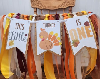 This little turkey is one high chair banner. Thanksgiving birthday party decorations.