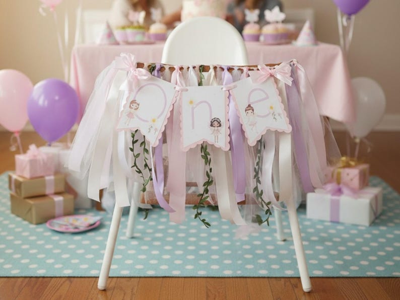 May include: A high chair decorated for a first birthday party. The chair is adorned with a banner that says "one" and has ribbons in white, pink, and lavender. Balloons, gifts, and a table with a pink tablecloth are in the background.