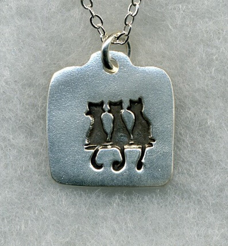 3 Cats on a Wall Silver Pendant image 1
