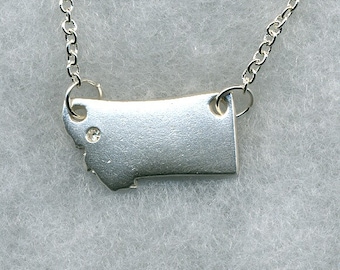 Montana Shaped pendants, made from recycled Silver