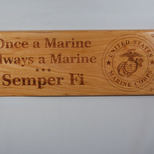 US Marine Corps Sign & Emblem Laser Engraved on 15" X 5-1/2" solid cherry.  Perfect gift for a veteran's home or office.