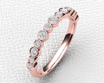 Rose gold bezel set Diamond band