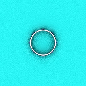 May include: A silver ring with a row of small blue gemstones around the band.