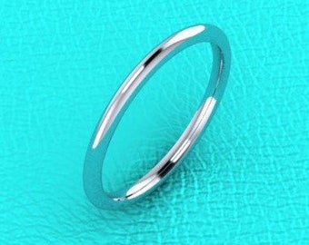 May include: A simple, polished silver band ring.