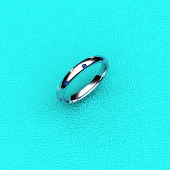 Platinum flush set Sapphire and Diamond band