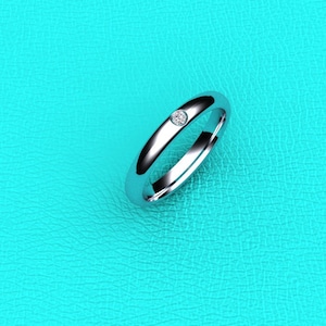 Platinum flush set diamond band