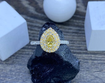 Pear shaped fancy yellow diamond ring halo pear shaped ring