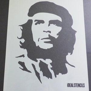May include: Black and white stencil of a man's face with a beard and a beret. The stencil is on a white background and has the text "IDEAL STENCILS" in the bottom right corner.