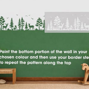 May include: A green and white wall with a forest border stencil. The stencil features trees, deer, and birds. The text says, "Paint the bottom portion of the wall in your chosen color and then use your border stencil to repeat the pattern along the top."