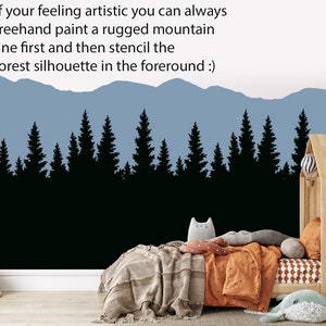 May include: A black silhouette of a forest against a blue mountain range. The image is a wall decal for a child's bedroom.