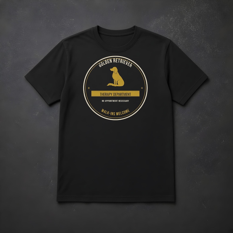 K&ouml;nnte beinhalten: Ein schwarzes T-Shirt mit kurzen &Auml;rmeln und einem kreisf&ouml;rmigen Aufdruck, der die goldene Silhouette eines Hundes zeigt. Der Text lautet: GOLDEN RETRIEVER, THERAPY DEPARTMENT, NO APPOINTMENT NECESSARY und WALK-INS WELCOME.