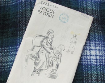 May include: Vintage Vogue sewing pattern for a child's coat. The pattern is for a 4 year old and is priced at 35 cents. The pattern shows a girl and a boy wearing the coat.